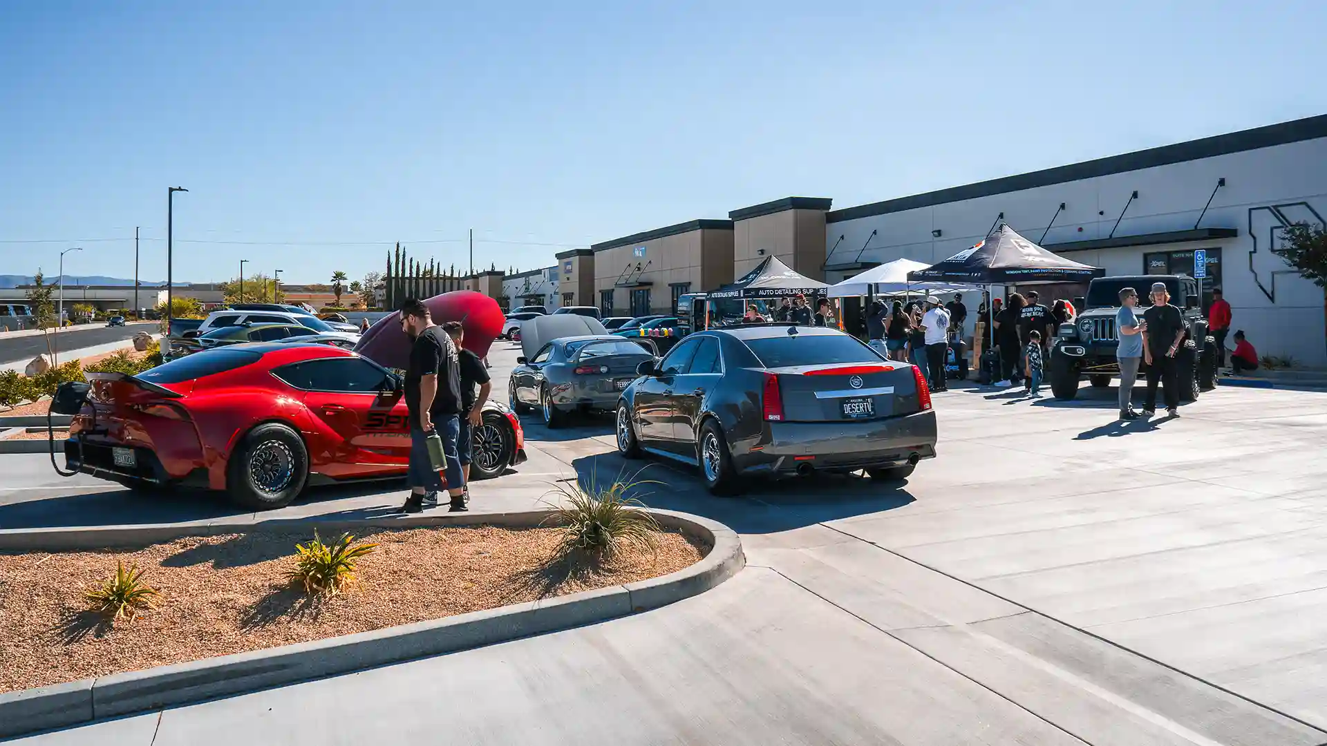 Wide shot of the Phantom Filmwerkz Grand Opening Car Show in Spring Valley Lake, September 2025